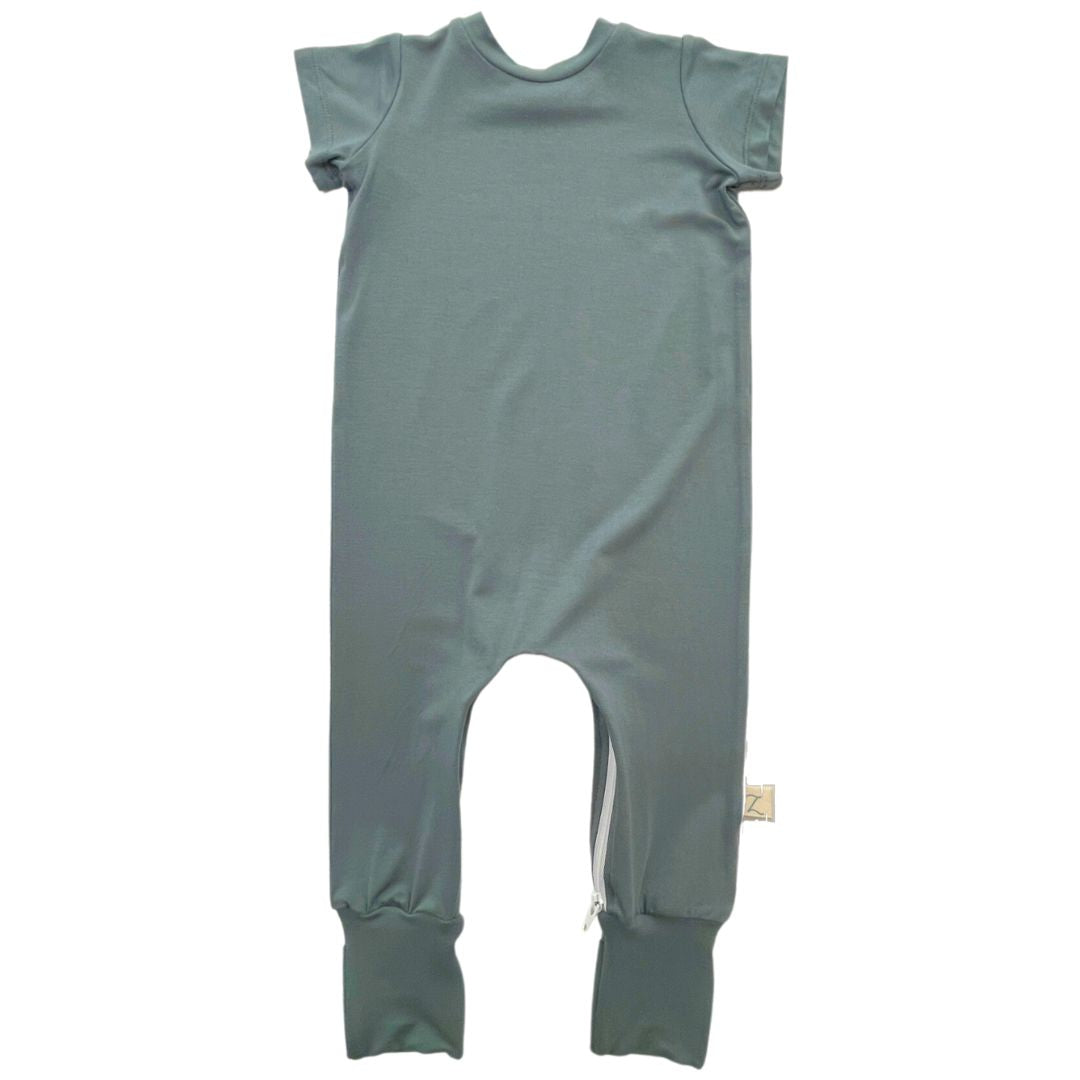 Flay lay of a deep teal Bamboo Lyocell Zipease Romper