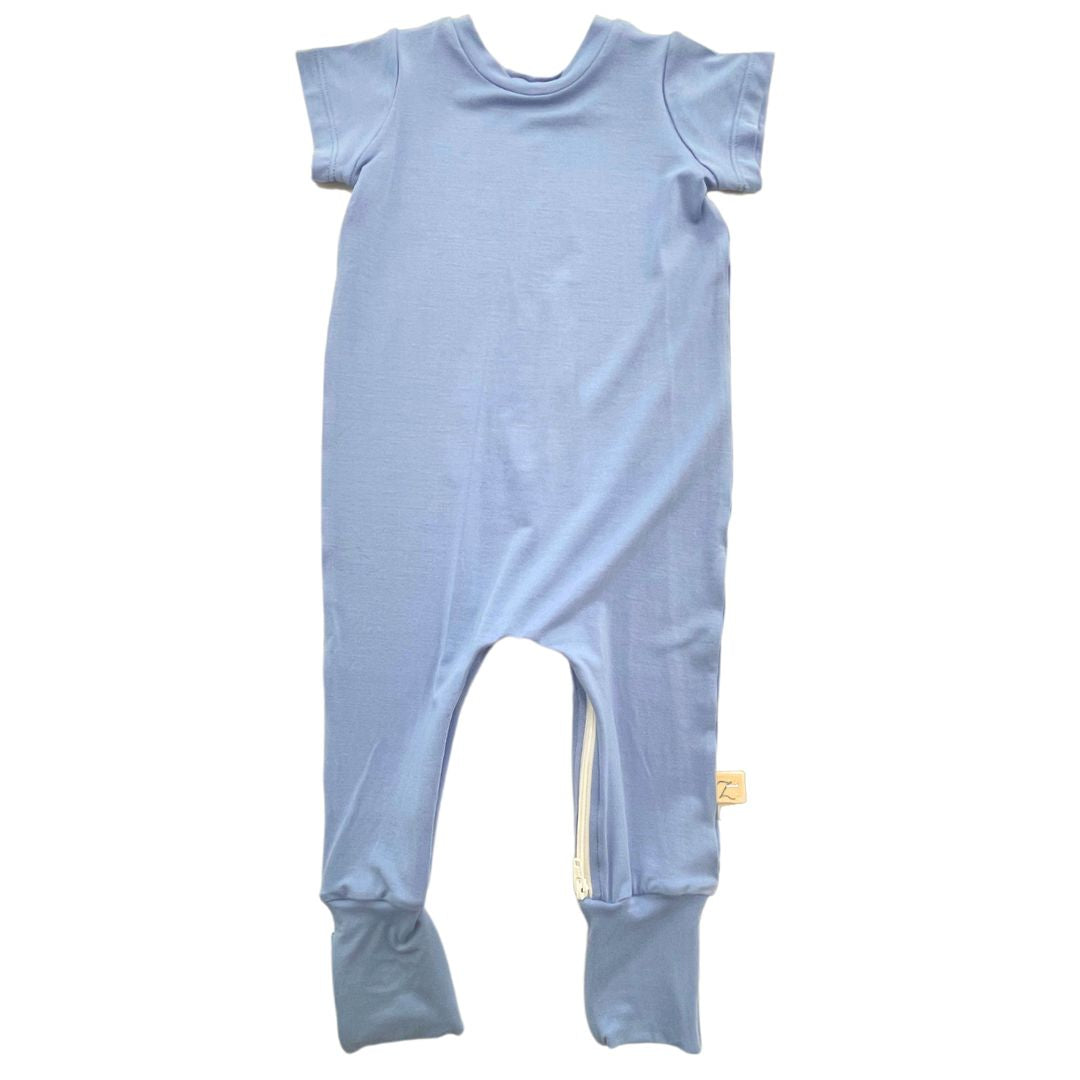 Flat lay of an ocean blue Bamboo Lyocell Zipease Romper